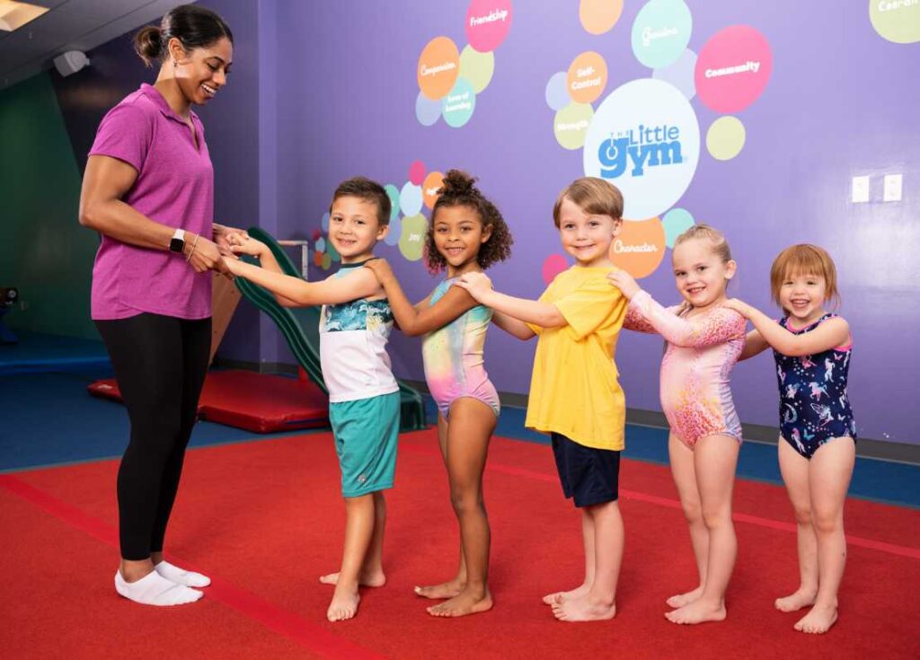 Grade School (2) group of children in a gymnastics class at the little gym