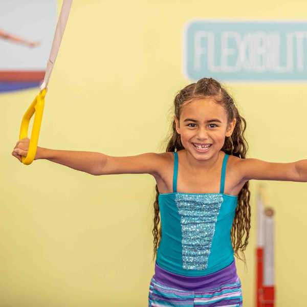 A little gym camp girl smiling